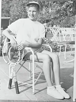 Rita Hayworth Posing with Tennis Rackets