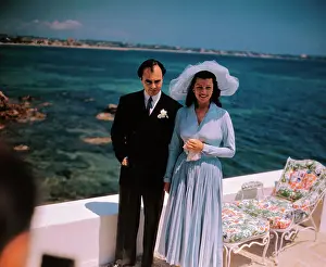 Cannes Prints: Rita Hayworth and Prince Aly Khan Standing on Yacht