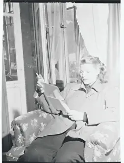 Gstaad Prints: Rita Hayworth Reading Papers