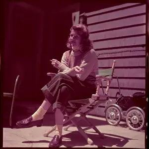 Rita Hayworth Sitting on Patio