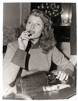 Rita Hayworth Smoking a Cigarette