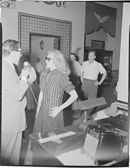 Rita Hayworth Speaking to Reporter