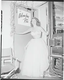 Rita Hayworth Standing In Doorway