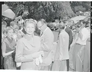 Rita Hayworth Surrounded by Photographers
