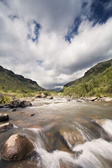Images Dated 17th November 2013: River landscape in Drakensberg with dramatic clouds and mountain