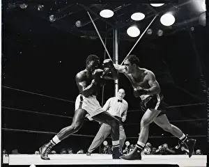 Bout Prints: R.Marciano Punches Ezzard Charles Face