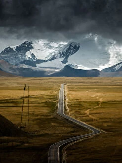 Road leading to Himalayas range on Tibet side