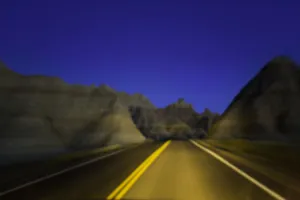 Images Dated 16th February 2006: Road through sandstone buttes, night (defocused)