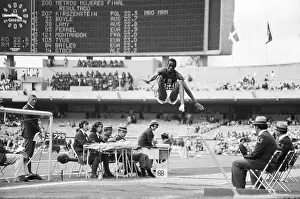 Track Official Prints: Robert Beamon Jumping to Break Record