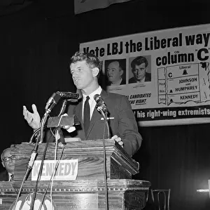 Robert F. Kennedy Gesturing at Microphones