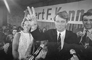 Robert F. Kennedy Gesturing for a Win at Microphone