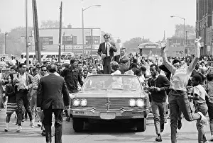 Robert F. Kennedy Standing and Laughing at Spectator With Uplifted Arms