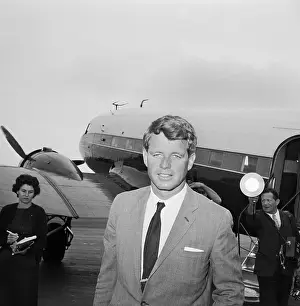 Robert F. Kennedy Standing Near Airplane