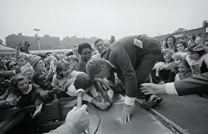 Tripping Prints: Robert F. Kennedy Stumbling to Keep His Balance Near Crowd