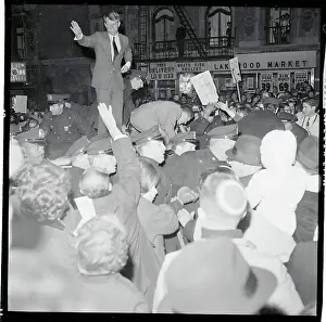 Robert F. Kennedy Waving Atop Automobile