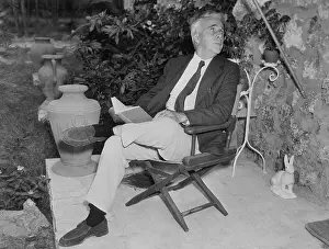 New Hampshire Prints: Robert Frost Sitting with Book in Hand