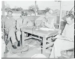Robert Gard Speaking with Newsmen
