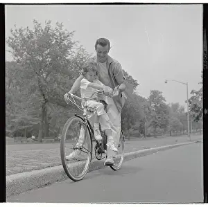 Robert Goulet Riding Bicycle with Daughter Nicki