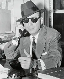 Telephoning Prints: Robert Harrison Speaking on Telephone