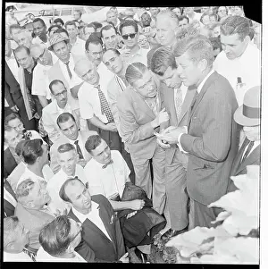Robert Kennedy Holding His Son