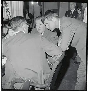 Warren G Prints: Robert Kennedy Leaning Over Warren Magnuson