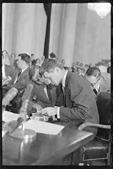 Robert Kennedy Looking at a Book