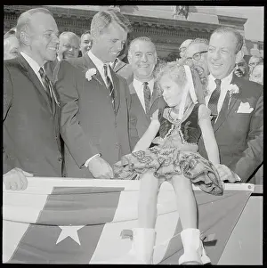 Robert F Prints: Robert Kennedy, Paul Screvane, and Robert F. Wagner with Young Girl at Parade