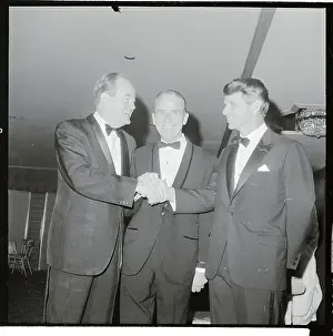 Robert Kennedy Performing a Three Way Handshake