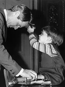 Robert Kennedy Playing with Child