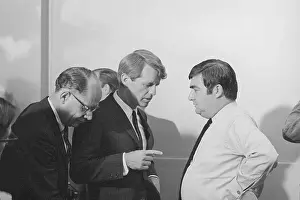 Robert Kennedy Talking to Pierre Salinger
