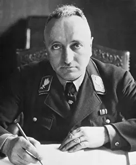 Robert Ley Pausing with Pen and Paper at His Desk
