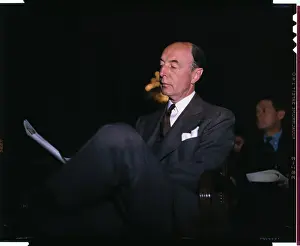 Robert Lovett Reading with Leg Crossed
