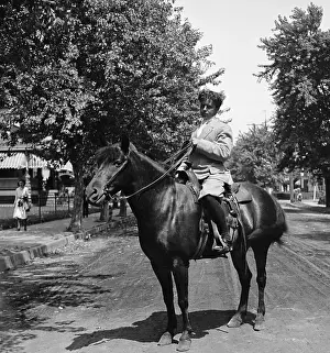 Robert McCay Riding a Horse