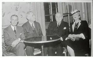 Robert R Prints: Robert McCormick Sitting with Others
