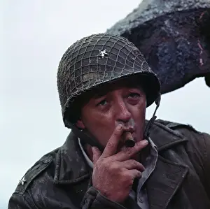 Robert Mitchum Smoking a Cigar