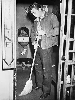Robert Mitchum Sweeping Jail Cell