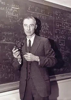Robert Oppenheimer Standing at Blackboard