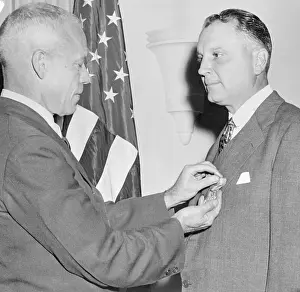 Robert Patterson Presenting Medal for Merit to Juan Trippe
