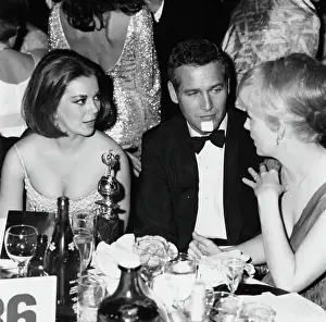 Prints of Actors (L-R) Natalie Wood, Paul Newman and Joanne Woodward sitting at their table at the Golden Globe Awards, 1965. (Photo by Max B. Miller/Fotos International/Archive Photos/Getty Images) Grace, Glamour & Timeless Elegance: Robert Redford, Natalie Wood And Ruth Gordon