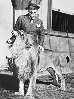 Robert Ripley Posing with Lion