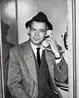 Telephone Booth Prints: Robert Ryan Arriving At Idewild Airport