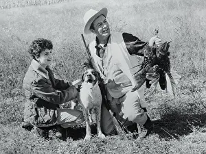 Robert Taylor Holding a Pheasant