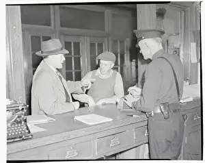 Robert Wilson Standing at Police Desk