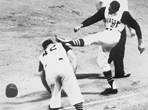 Roberto Clemente Kicking His Cap