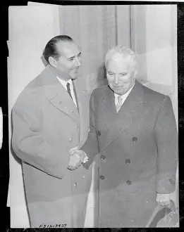 Roberto Rossellini Shaking Hands with Charlie Chaplin
