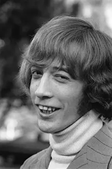 Prints of LOS ANGELES - JANUARY 26: Robin Gibb of the pop group The Bee Gees poses for a portrait on January 26, 1968 in Los Angeles, California. (Photo by Michael Ochs Archives/Getty Images) A Visual Journey Through the Legendary Brothers’ Timeless Legacy: Robin Gibb