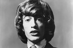 Prints of CIRCA 1967: Robin Gibb of the pop group The Bee Gees poses for an Atco Records publicity still circa 1967. (Photo by Michael Ochs Archives/Getty Images) A Visual Journey Through the Legendary Brothers’ Timeless Legacy: Robin Gibb