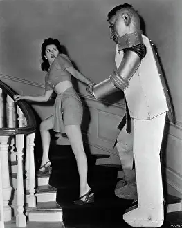Strange Prints: Robot Follows Woman Upstairs