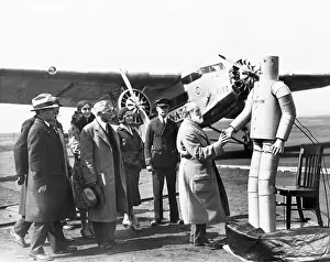 Robot Shakes Elderly Pilot'S Hand
