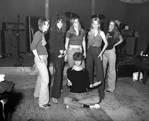 Rock band The Runaways with their producer Kim Fowley